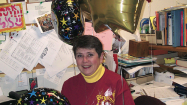 DEBBIE HOUGH ENJOYS THE CONGRATULATIONS OF HER OWN CONGREGATION UPON HEARING THAT COLLEAGUES HAD VOTED HER EDUCATOR OF THE YEAR. (PHOTO BY: EVERAFTER DESIGNS BY JLM)