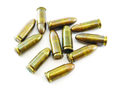 11mm bullets for a short gun. bullets isolated on white background.