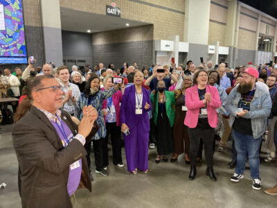 a spontaneous group of United Methodists in singing songs of liberation after the vote to eliminate a ban on the ordination of gay clergy, at the General Conference of the United Methodist Church in Charlotte, N.C., on May 1, 2024. 
