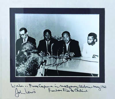 The Rev. Ralph Abernathy, the Rev. Martin Luther King Jr. and John Lewis.