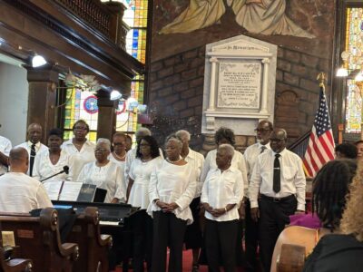 A choir sings in a church.