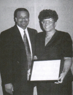 Pat Gresham and her son, Kermit Gresham, at a 2003 dinner in Charlotte, North Carolina. At the dinner, Pat, who was guest of honor, received an award for her service to the Outlook and the PC(USA).