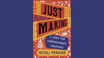 White leaves and flowers on a orange background.