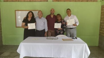 Joseph Russ (center) with participants upon receiving their certificates in migrant ministries (photo contributed by Joseph Russ).