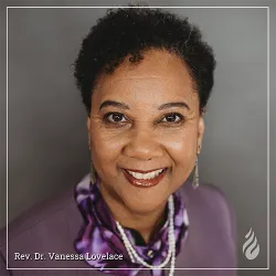 A woman poses for a professional headshot.