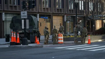 National guardsmen at a downtown intersection in Washington, DC.