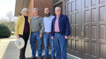 Freda Schlaman, from left, Tim Gilland, the Rev. Matt Conner and Trent Thompson pose together at Newell Presbyterian Church in Charlotte, N.C. (RNS photo/Yonat Shimron)