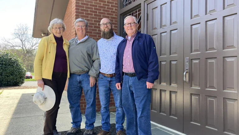 Freda Schlaman, from left, Tim Gilland, the Rev. Matt Conner and Trent Thompson pose together at Newell Presbyterian Church in Charlotte, N.C. (RNS photo/Yonat Shimron)