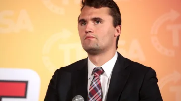 Charlie Kirk speaks with attendees at the Culture War tour at Antelope Gymnasium at Grand Canyon University in Phoenix, Arizona