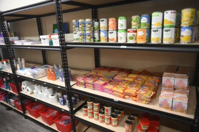 Shelves with shelf stable foods on them. 