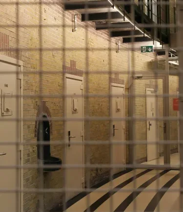 a photo of a prison hallway