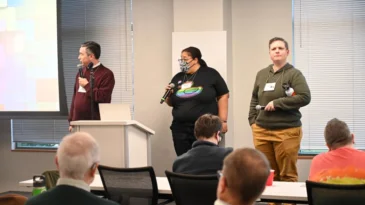 The Rev. Brian Ellison, the Rev. Ashley DeTar Birt, and Melonee Tubb lead a talk at the National Queer Presbyterian Gathering. (photos by Alex Simon)