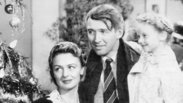 Jimmy Stewart, Donna Reed, and Karolyn Grimes in "It's a Wonderful Life" (1946). (National Telefilm Associates via WikiMedia Commons)