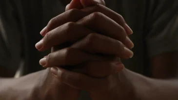 hands folded in prayer