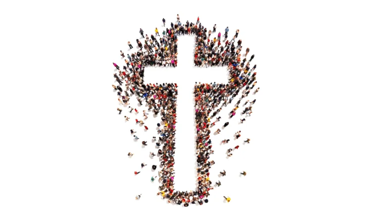 People in a group standing in the shape of a cross.