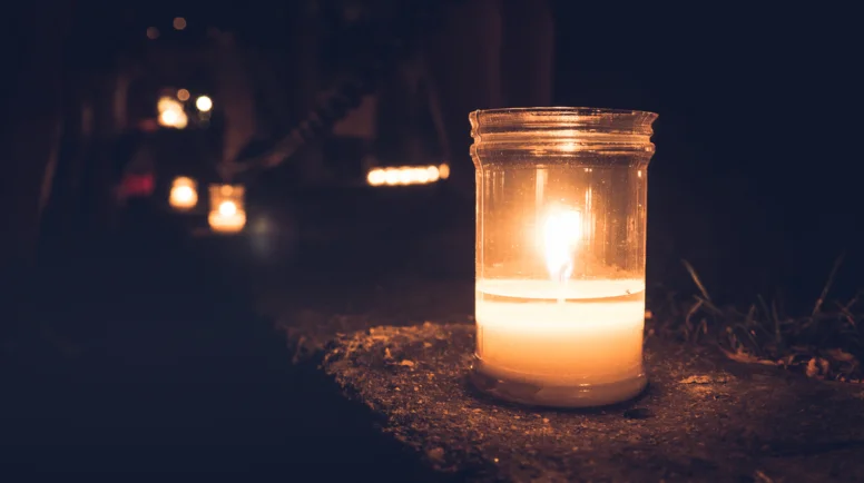 Sweet and warm candle with soft dark background