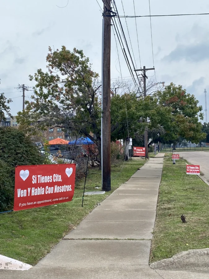 A sign in Spanish at the ICE field office in Dallas, Texas, reads, “If you have an appointment, come and talk to us.”