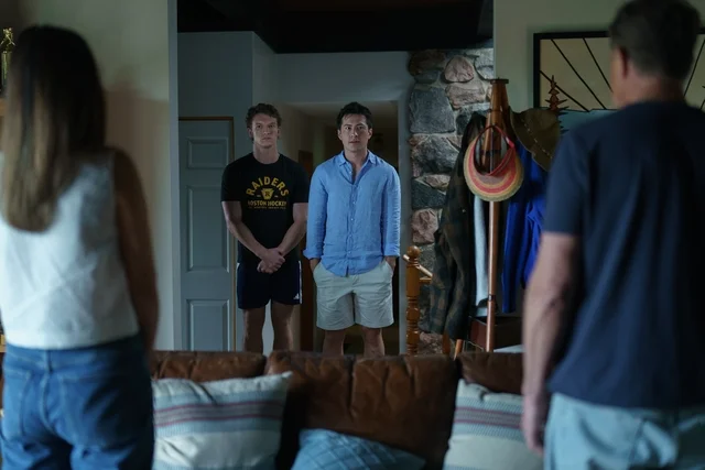 A still from HBO's Heated Rivalry, where one of the characters is about to come out to his parents.