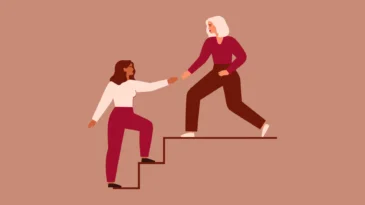 a woman walking up stairs. another woman lending a hair.