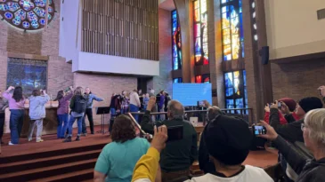 Attendees role play scenarios of interacting with immigration agents during a rapid response training organized by G92 at Central Christian Church