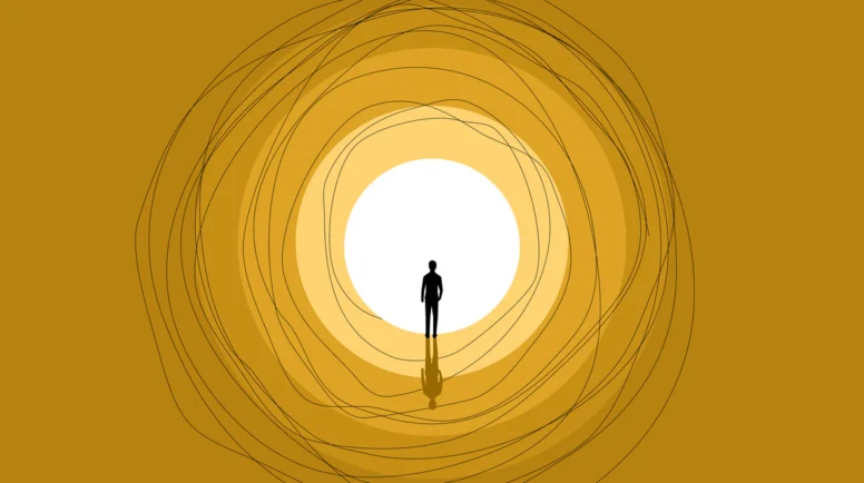 An illustration of a man seeing light at the end of a tunnel