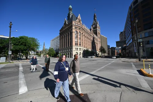 The Rev. Ann Gibbs and the Rev. Jimmie Hawkins, the PC(USA)'s advocacy director, walk the route that the "Healing Not Harm" action will take on June 27.