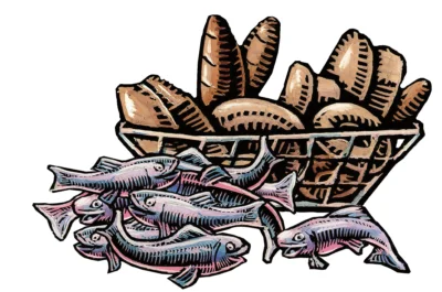 Basket of bread loaves with fishes outside of it
