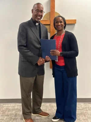 2026 E.T. Thompson Awardee the Rev. Jimmie Hawkins and Outlook Board President the Rev. Dr. Bridgett Green pose for a photo.