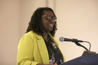 Dr. Natarsha Prince Sanders speaking at the Women of Faith Breakfast