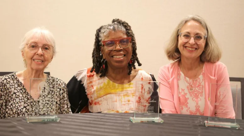 Blanca Estrella Otaño-Rivera, Selma Jackson and Adele Langworthy (from left) pictured smiling together at the Women of Faith Breakfast