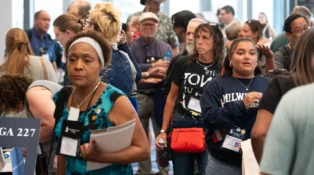 Participants congregate at the Town Square, learning about various denominational agencies, General Assembly Committees, and other PC(USA)-related organizations.