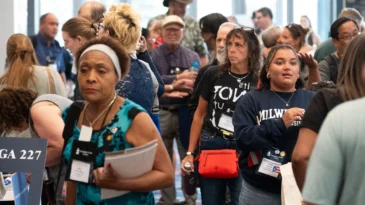 Participants congregate at the Town Square, learning about various denominational agencies, General Assembly Committees, and other PC(USA)-related organizations.