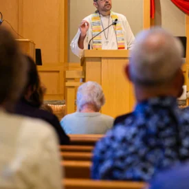 Rev. Dr. Brett Swanson leads worship at Wauwatosa Presbyterian Church.