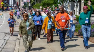 Jimmie Hawkins leads a group of Presbyterians in a demonstration against gun violence at General Assembly 227.
