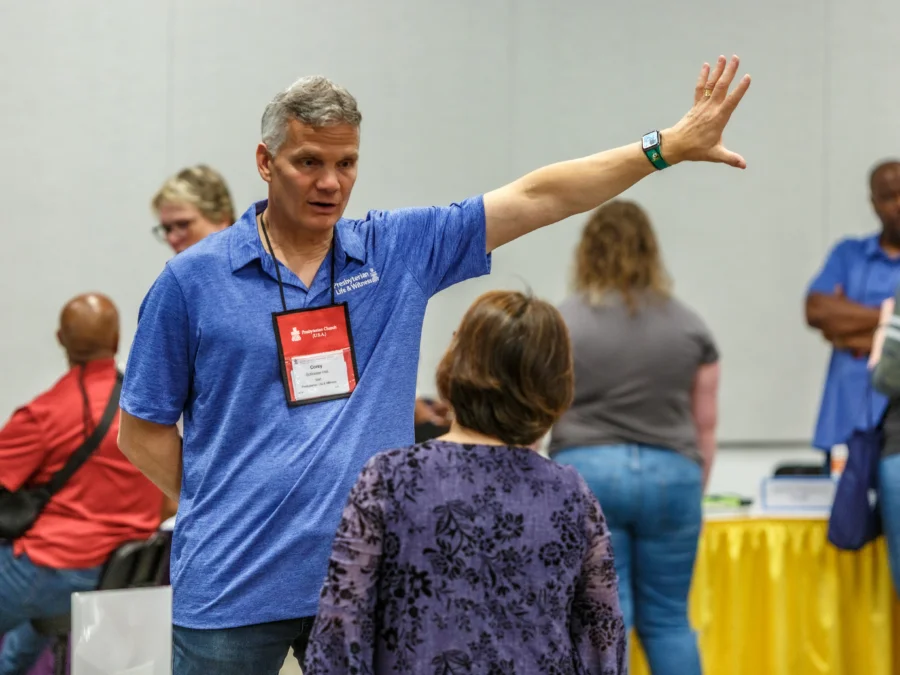 Deputy Executive for Vision, Innovation & Rebuilding Corey Schlosser-Halltables at the GA227 Town Square. 