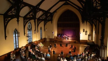 A sanctuary with people in it
