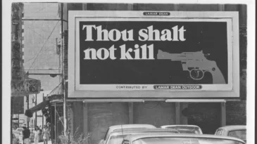 A billboard that reads: "Thou shalt not kill" with a picture of a gun