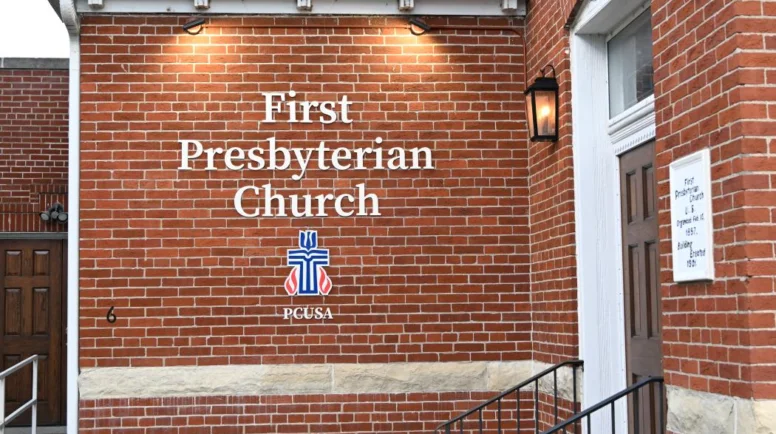 A brick wall that says First Presbyterian Church.