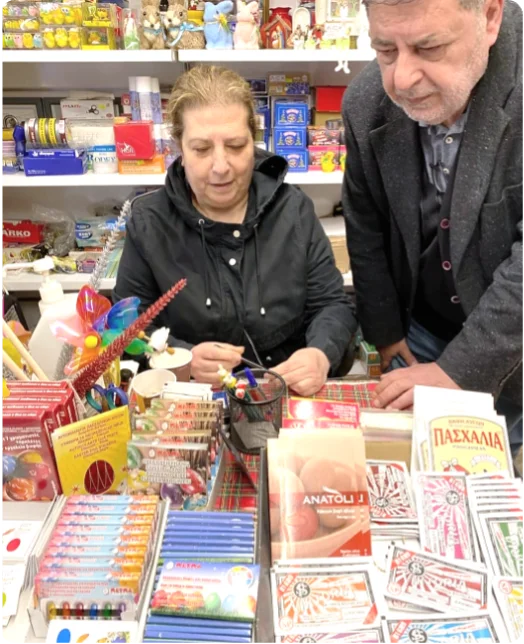 A woman sells kits to create decorated Easter eggs.