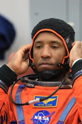 Astronaut checking their spacesuit