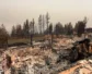 The remnants of a burnt house.
