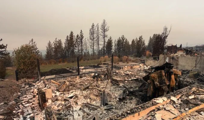 The remnants of a burnt house.