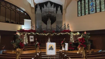 An empty sanctuary decorated for Advent
