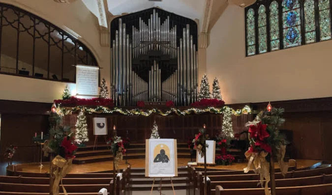 An empty sanctuary decorated for Advent