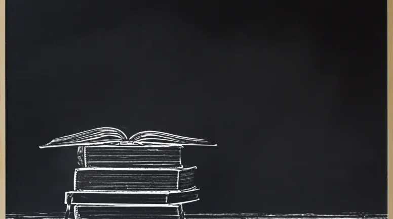 Black chalkboard frame with stacked and open books