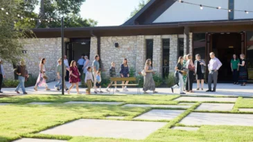 People walk into Covenant Presbyterian Church in Austin, Texas.