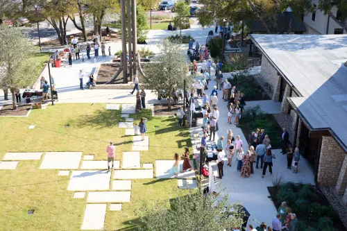 People gather outside Covenant Presbyterian Church in Austin, Texas.