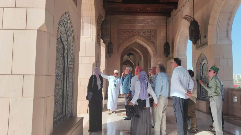 Visitors are shown the Grand Mosque in Abu Dhabi.