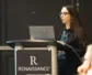 Erica Dollhopf of the Lake Institute on Faith and Giving speaks behind a podium